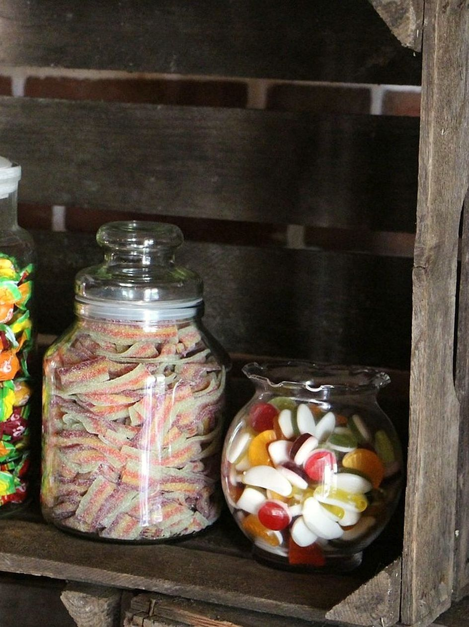 Watermelon gummy bears and jelly lollipops